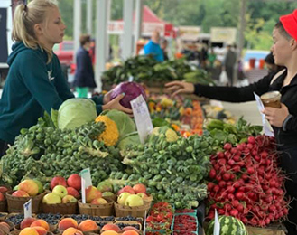 Farmers Market Customer and Vendor Peaches