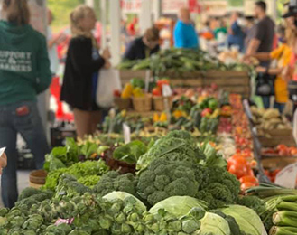 Farmers Market Customers and Vegetables