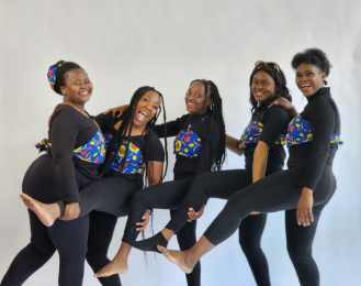 Photo of members from the Seben Dance group posing for a photo